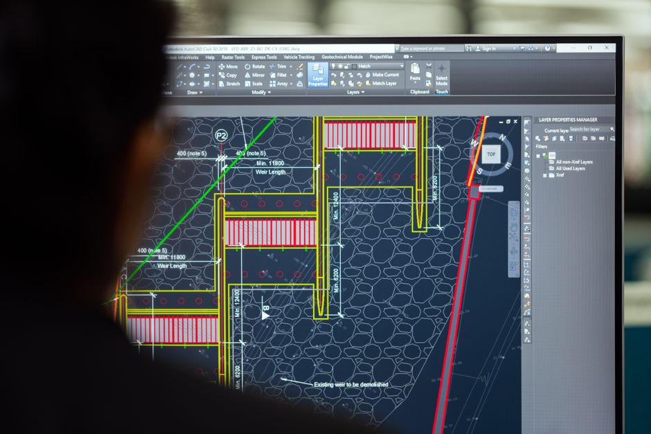 Engineers reviewing plant design